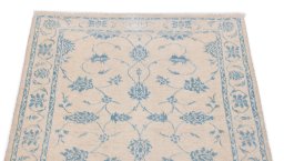 Surface texture of New Isfahan rug with natural Wool and intricate pattern