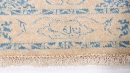 Close-up detail of New Isfahan rug from Iran / Persia showing Wool weave
