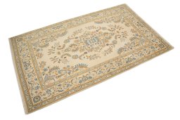 Corner detail of 1950s Kashan rug showing border pattern and Wool pile