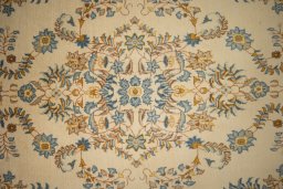 Central medallion detail of 1950s Kashan rug from Iran / Persia