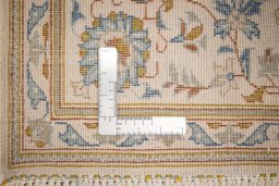 Full view of 1950s Kashan rug from Iran / Persia, 229 × 142 cm in Cream tones
