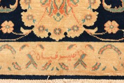 Backside of handmade 1990s Isfahan rug showing knot structure and weave density
