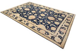 Corner detail of 1990s Isfahan rug showing border pattern and Wool pile