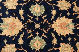 Close-up detail of 1990s Isfahan rug from Iran / Persia showing Wool weave