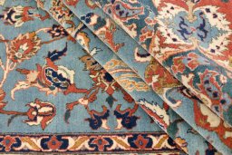 Corner detail of 1920s Isfahan rug showing border pattern and Wool pile