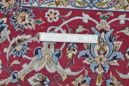 Corner detail of New Isfahan rug showing border pattern and Cork pile