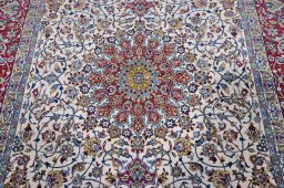 Backside of handmade New Isfahan rug showing knot structure and weave density