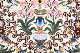 Corner detail of New Isfahan rug showing border pattern and Cork pile