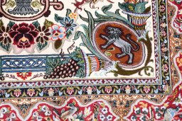 Backside of handmade New Isfahan rug showing knot structure and weave density