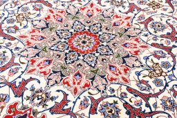 Backside of handmade New Isfahan rug showing knot structure and weave density