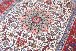 Central medallion detail of New Isfahan rug from Iran / Persia