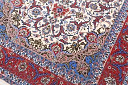 Backside of handmade New Isfahan rug showing knot structure and weave density