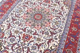 Central medallion detail of New Isfahan rug from Iran / Persia