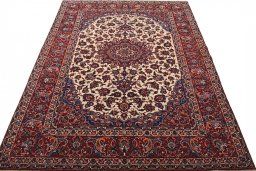 Surface texture of 1930s Isfahan rug with natural Wool and intricate pattern