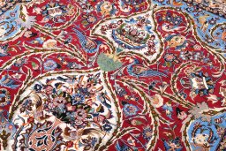Central medallion detail of New Isfahan rug from Iran / Persia