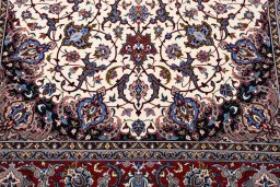 Backside of handmade New Isfahan rug showing knot structure and weave density