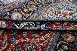 Corner detail of New Isfahan rug showing border pattern and Cork pile