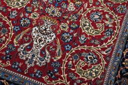 Central medallion detail of New Isfahan rug from Iran / Persia