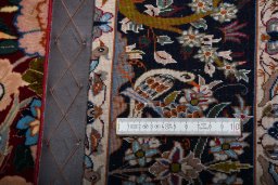 Backside of handmade New Isfahan rug showing knot structure and weave density