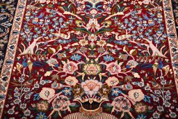 Central medallion detail of New Isfahan rug from Iran / Persia
