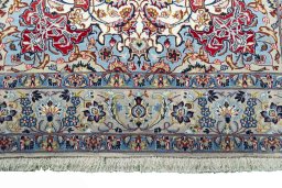 Corner detail of 2000s Isfahan rug showing border pattern and Cork pile