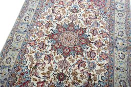 Backside of handmade 2000s Isfahan rug showing knot structure and weave density