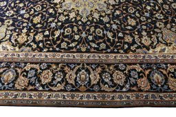 Corner detail of 2000s Isfahan rug showing border pattern and Wool pile