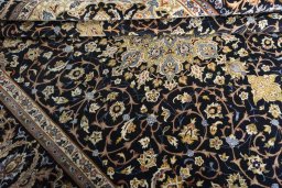 Close-up detail of 2000s Isfahan rug from Iran / Persia showing Wool weave