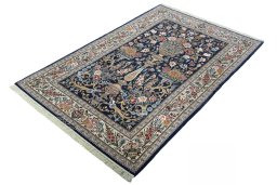 Corner detail of New Isfahan rug showing border pattern and Cork pile