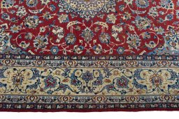 Corner detail of 1970s Isfahan rug showing border pattern and Cork pile