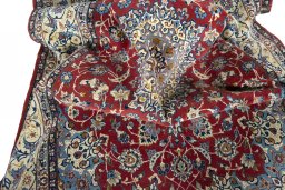 Surface texture of 1970s Isfahan rug with natural Cork and intricate pattern
