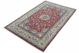 Corner detail of 1970s Isfahan rug showing border pattern and Cork pile