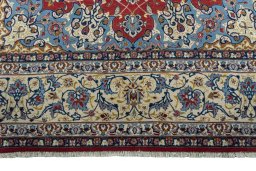 Full view of 1970s Isfahan rug from Iran / Persia, 232 × 150 cm in Red tones