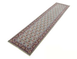 Corner detail of New Isfahan rug showing border pattern and Cork pile