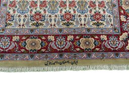 Central medallion detail of New Isfahan rug from Iran / Persia
