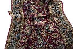 Surface texture of 2000s Isfahan rug with natural Cork and intricate pattern