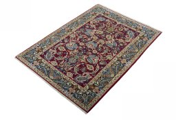 Corner detail of 2000s Isfahan rug showing border pattern and Cork pile