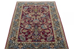 Surface texture of 2000s Isfahan rug with natural Cork and intricate pattern