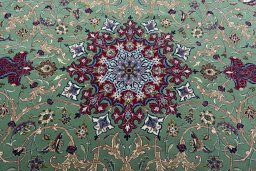 Central medallion detail of New Isfahan rug from Iran / Persia