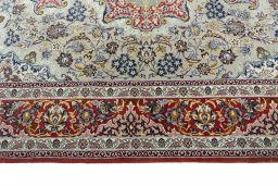 Corner detail of 2000s Isfahan rug showing border pattern and Cork pile