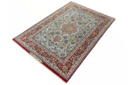 Corner detail of 2000s Isfahan rug showing border pattern and Cork pile