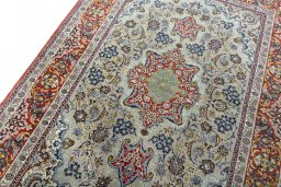 Backside of handmade 2000s Isfahan rug showing knot structure and weave density