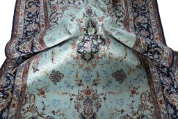 Surface texture of New Isfahan rug with natural Cork and intricate pattern
