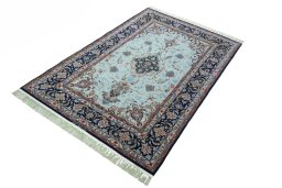 Corner detail of New Isfahan rug showing border pattern and Cork pile