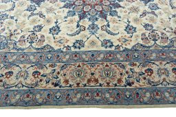 Corner detail of 2000s Isfahan rug showing border pattern and Cork pile