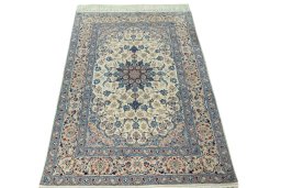 Surface texture of 2000s Isfahan rug with natural Cork and intricate pattern