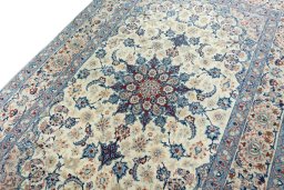 Backside of handmade 2000s Isfahan rug showing knot structure and weave density