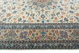 Corner detail of 1970s Isfahan rug showing border pattern and Cork pile