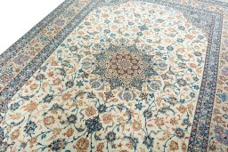 Backside of handmade 1970s Isfahan rug showing knot structure and weave density