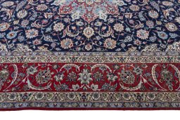 Corner detail of New Isfahan rug showing border pattern and Cork pile